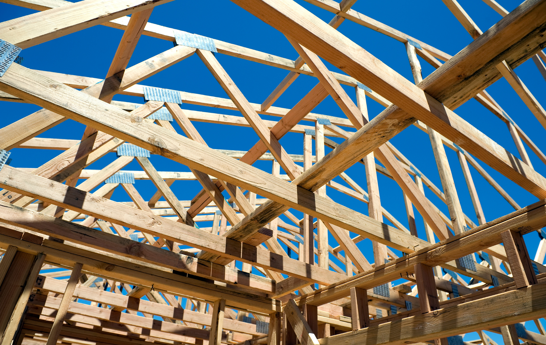 Looking up at the roof of a building under construction.