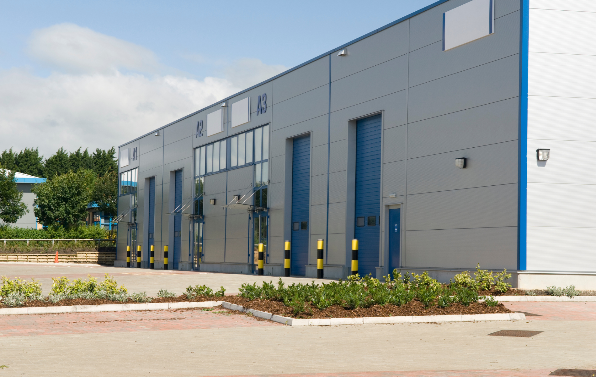 A large building with a lot of doors on it