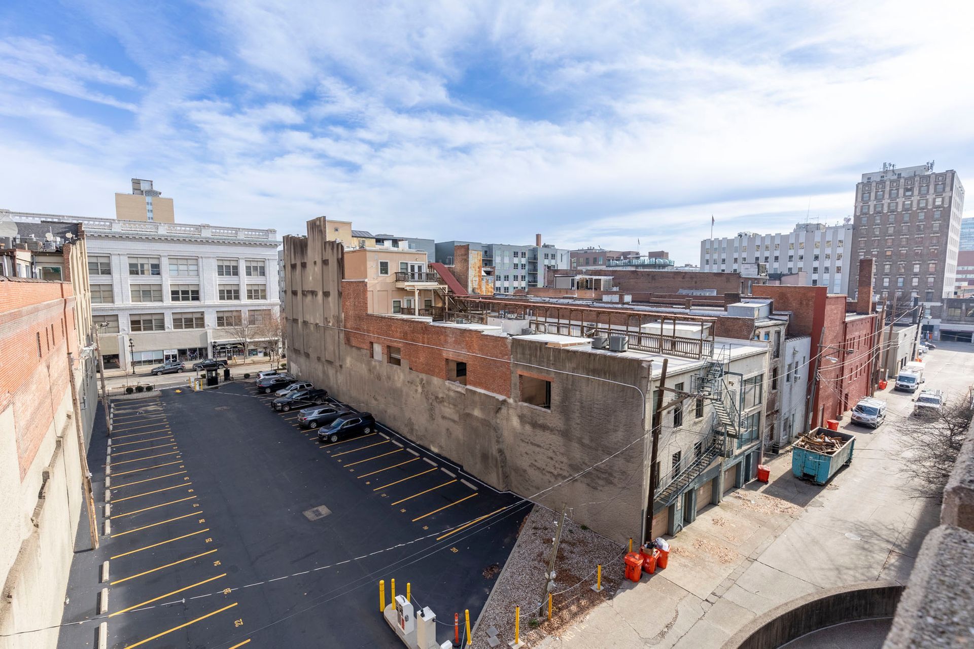 an aerial view of a parking lot in a city