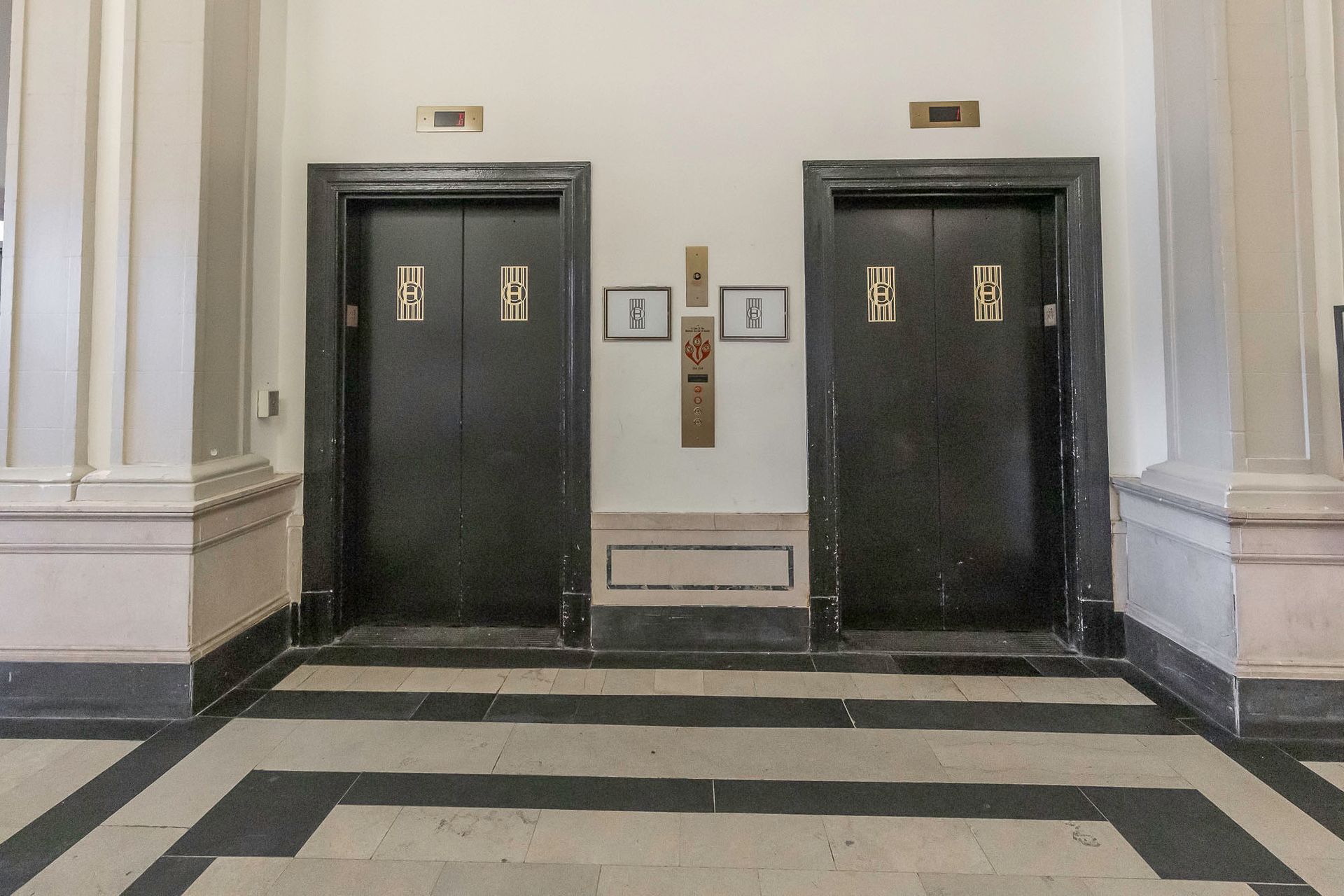 Two elevators with the numbers 5 and 6 on them