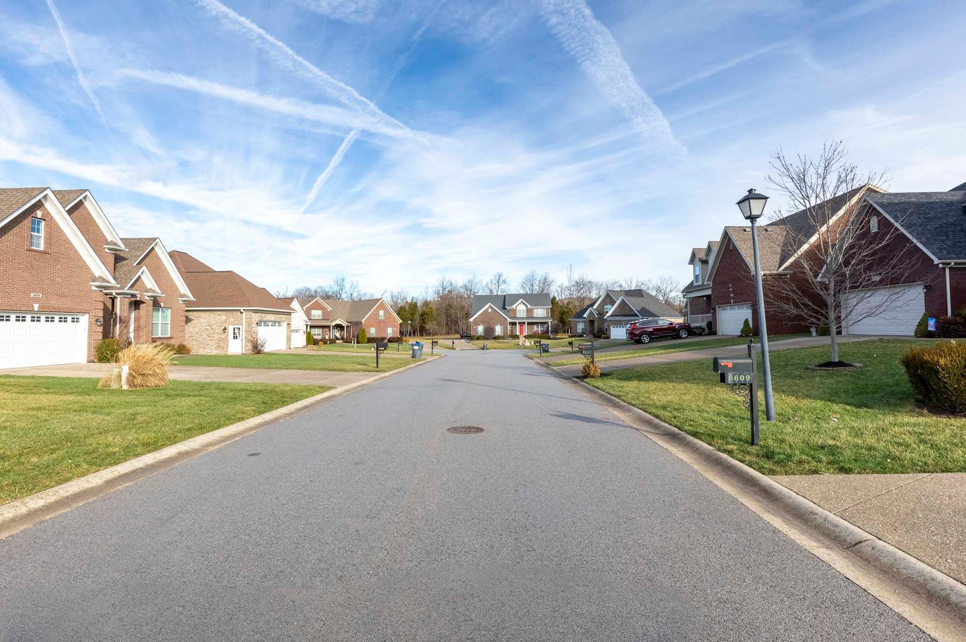 a residential street with a lot of houses on it .