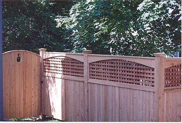 custom light colored wooden fencing Holbrook MA Mutual Fence Co Llc