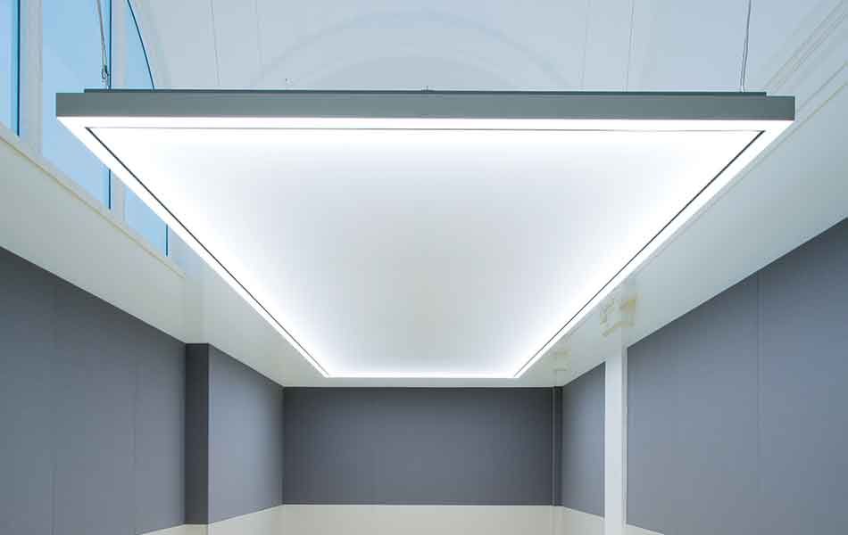 Metal grid ceiling with recessed lighting.