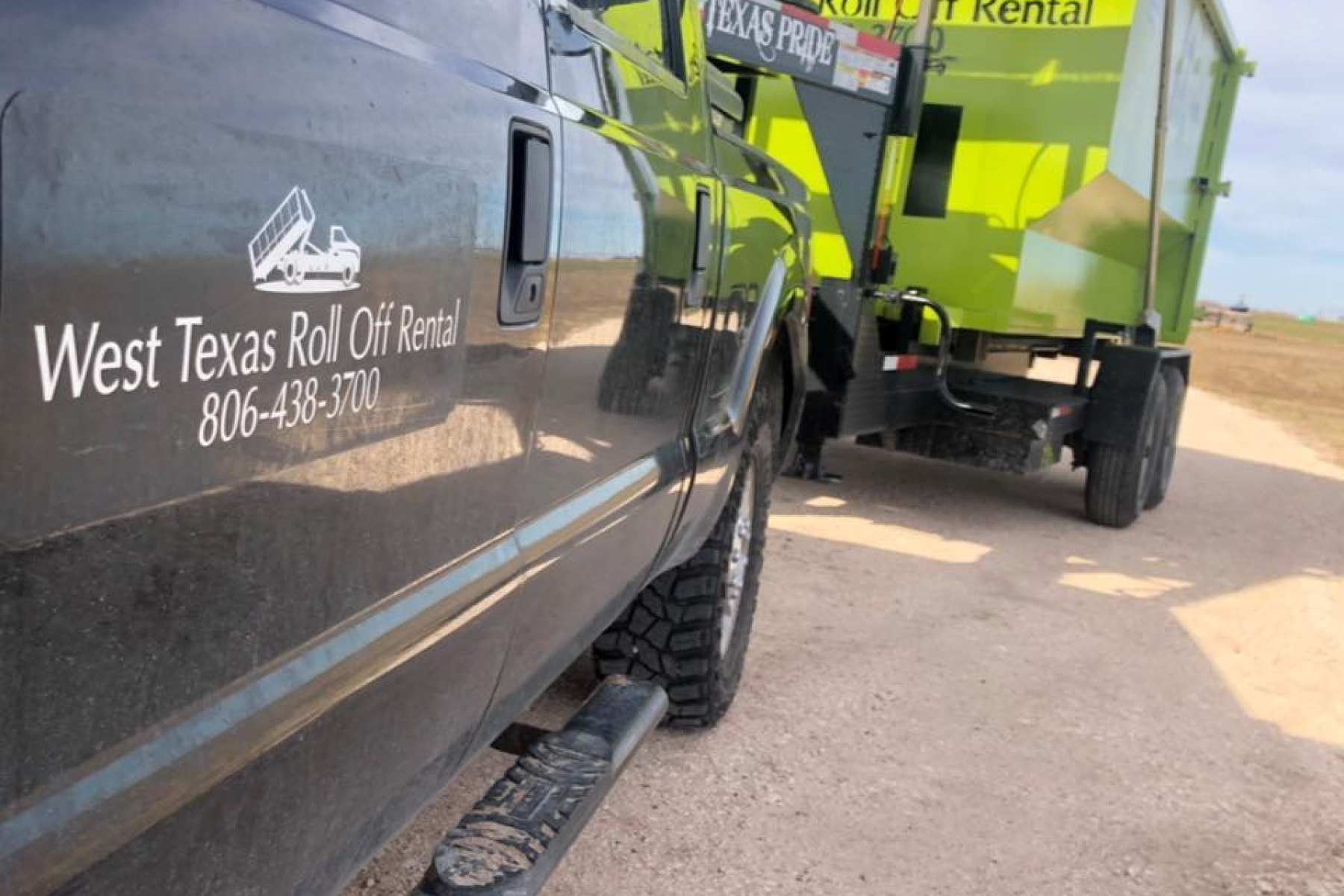 A black truck with the word west texas on the side