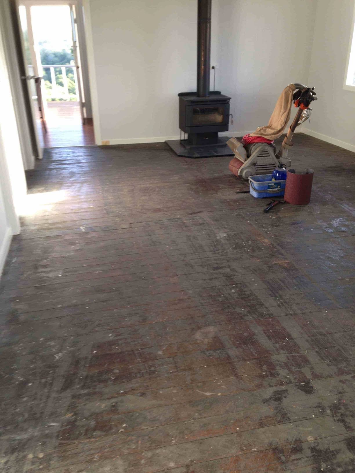 Bedroom Area With Polished Floors And Wooden Cabinets — Flooring In Sharon, QLD