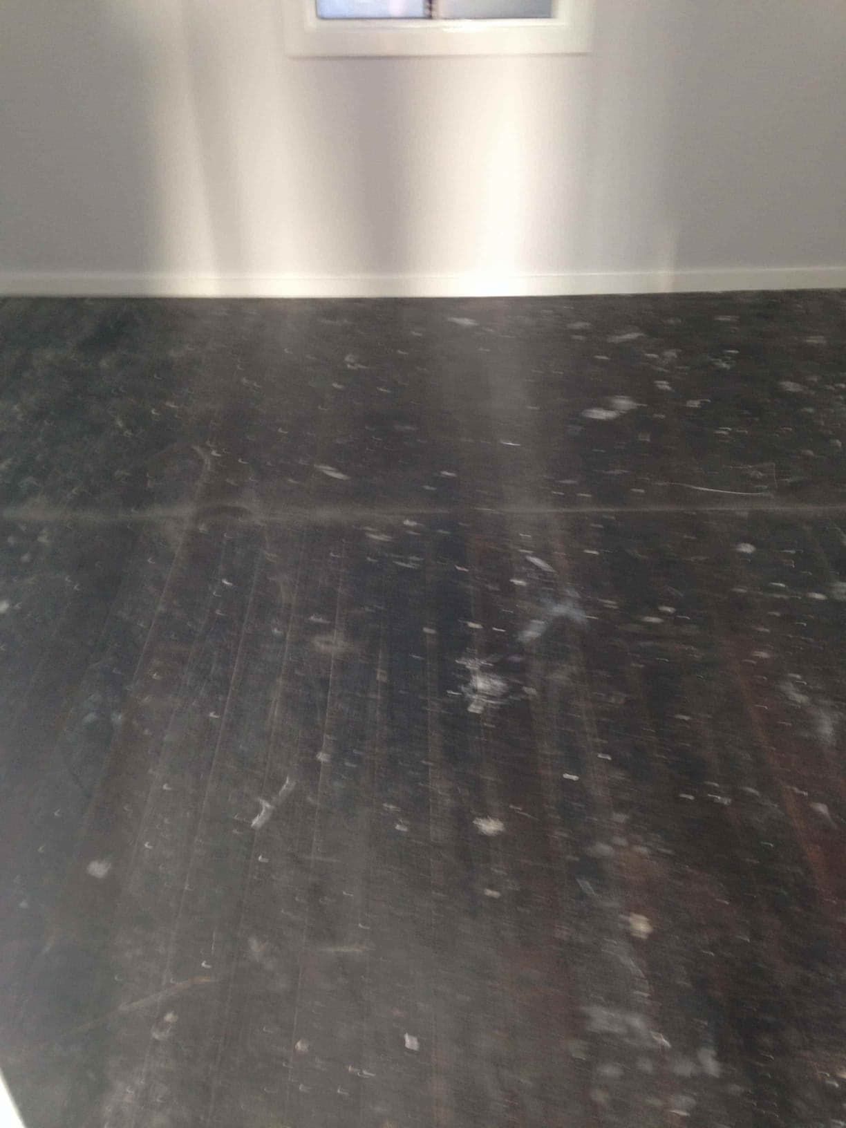 Painted black flooring — Flooring In Sharon, QLD