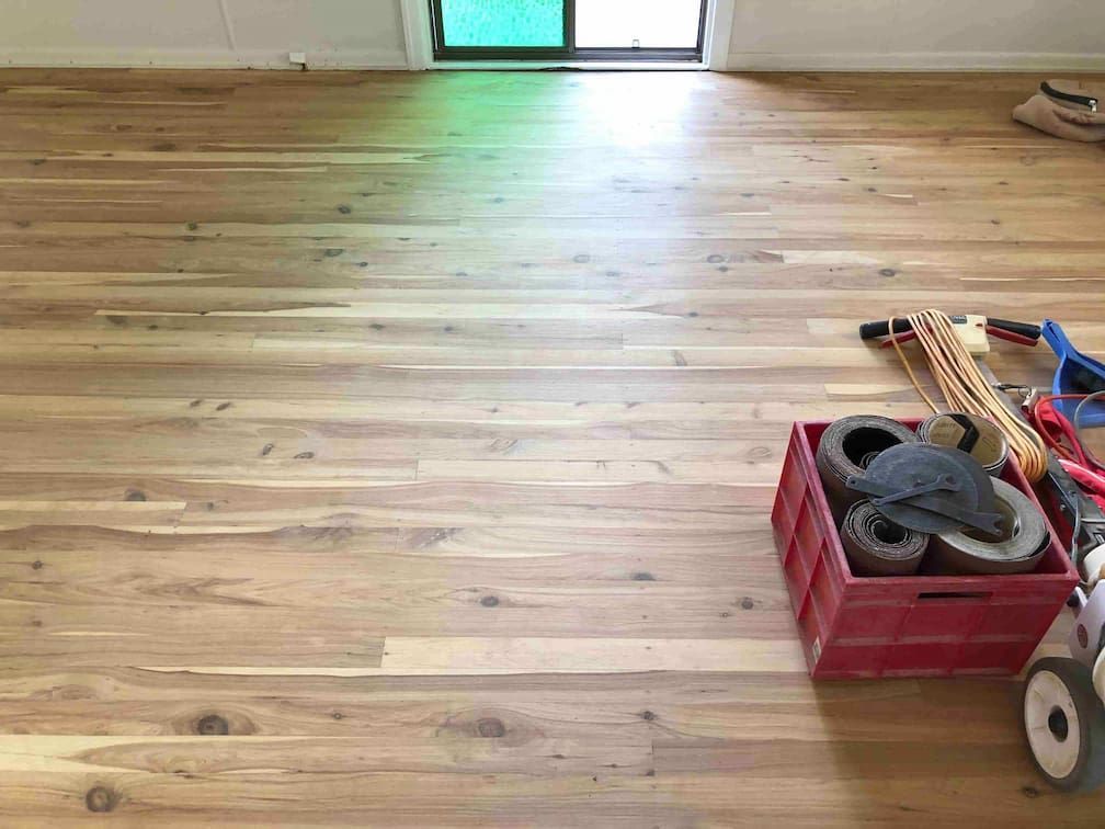 Solid oak wood flooring with equipment — Flooring In Sharon, QLD