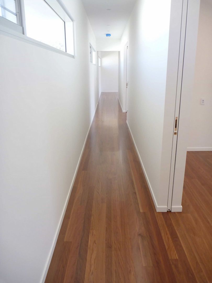 Timber flooring hallway — Flooring In Sharon, QLD