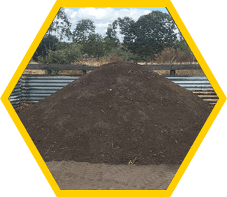 Black vegetation mulch in pile in Emerald