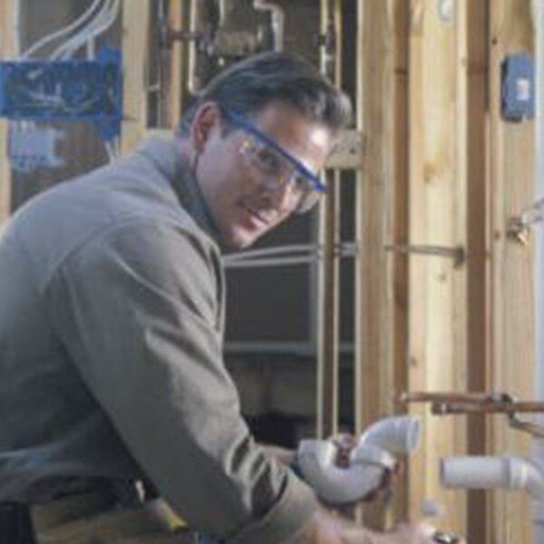 worker smilling — plumbing services in Port Charlotte, FL