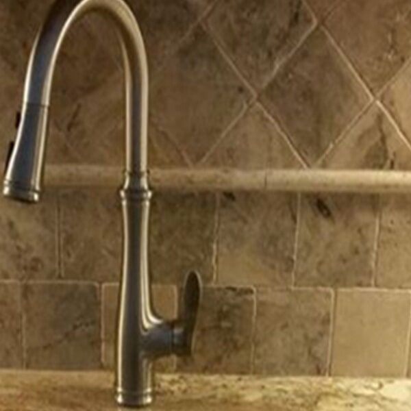 brown tiles and faucet — plumbing services in Port Charlotte, FL
