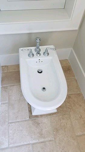 Small toilet sample — plumbing services in Port Charlotte, FL