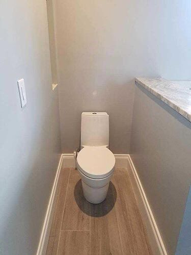Toilet in small room sample — plumbing services in Port Charlotte, FL