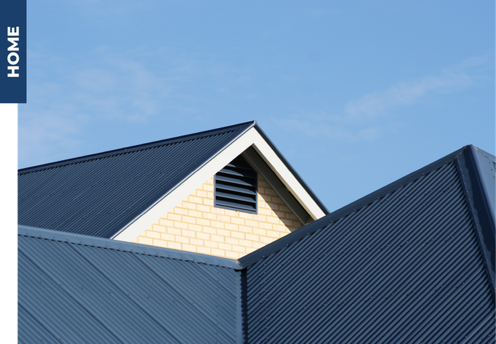 A picture of a house with a blue roof