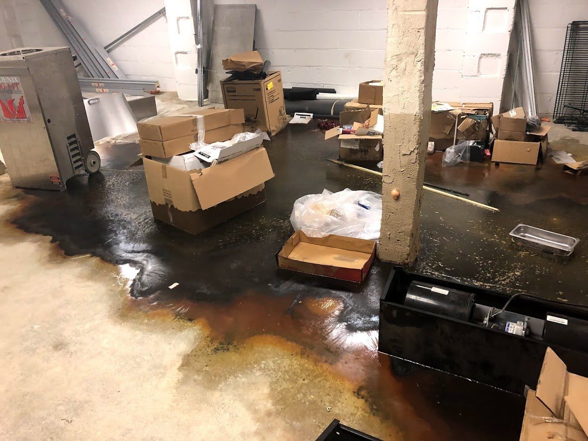 A warehouse filled with boxes and a lot of water.