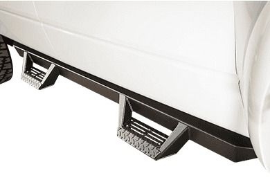 A white truck with black side steps