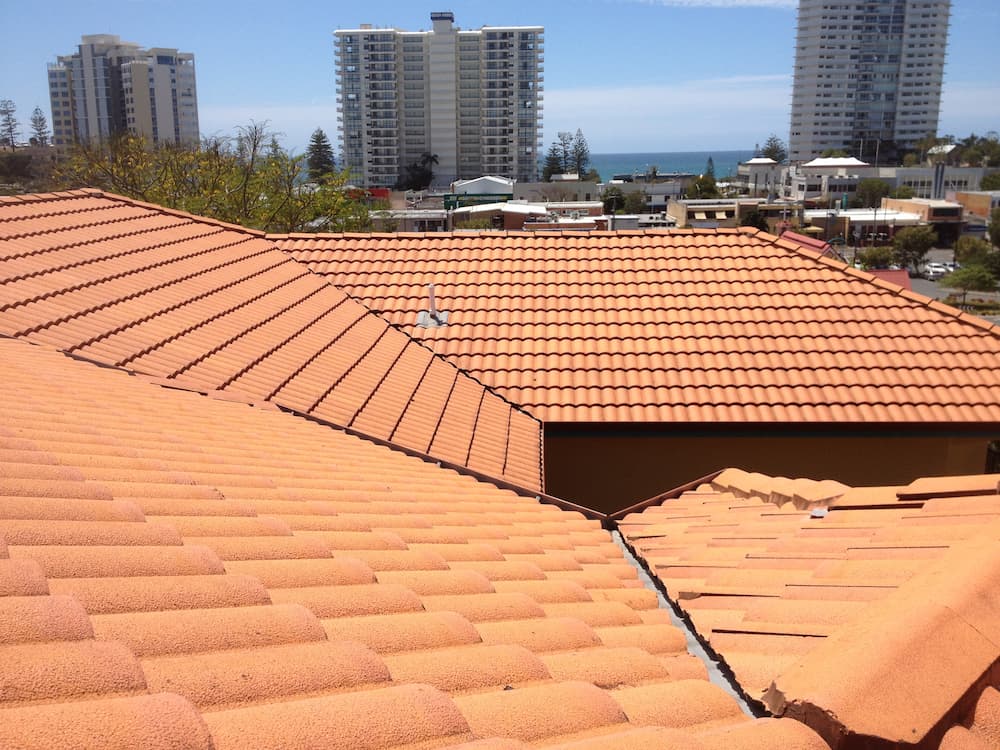 A Tiled Roof With a View of a City and the Ocean — Killiby & Co Roofing Pty Ltd In Tweed, NSW