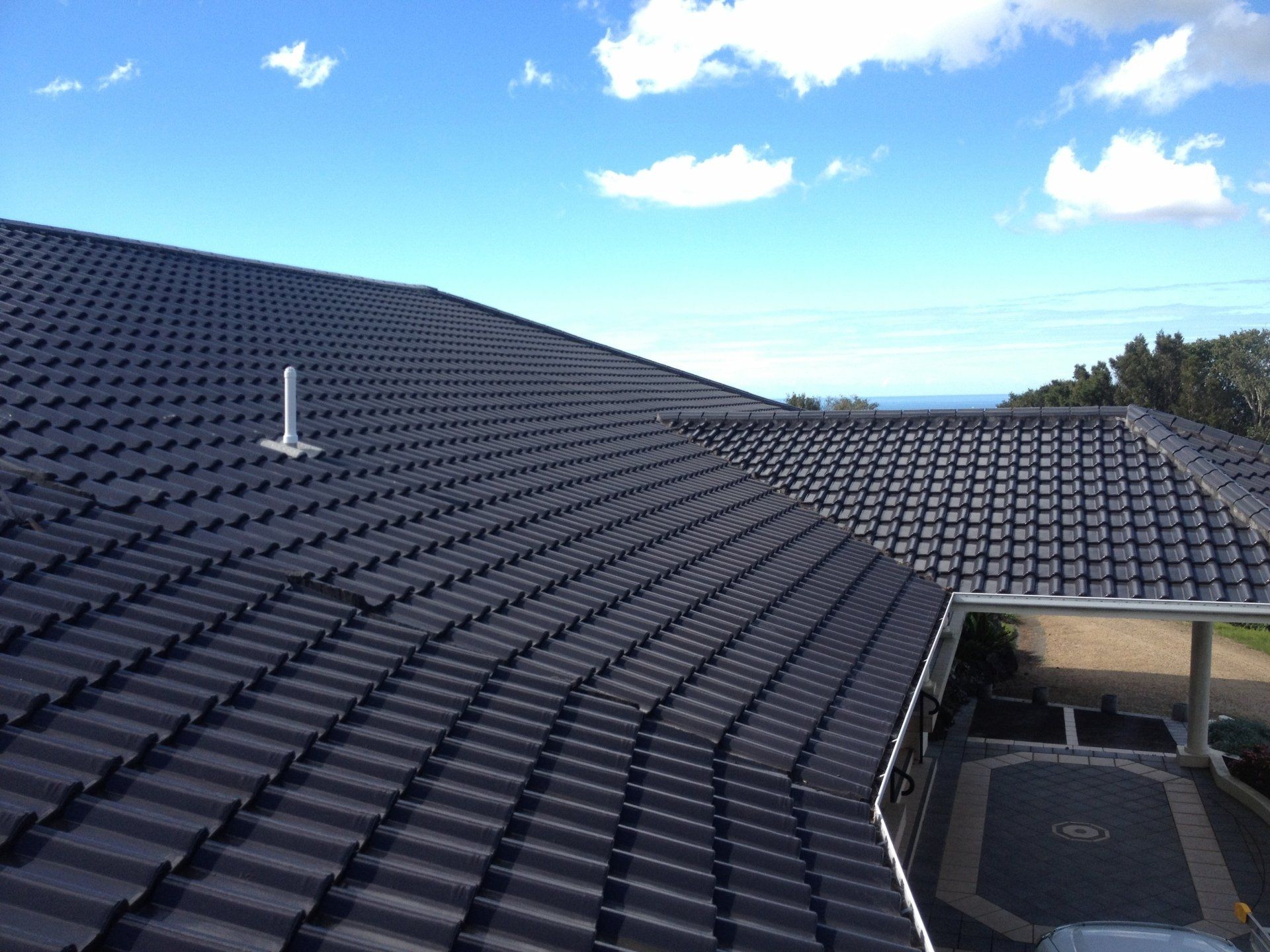The Roof of a House Has a Lot of Tiles on It — Killiby & Co Roofing Pty Ltd In Tweed, NSW