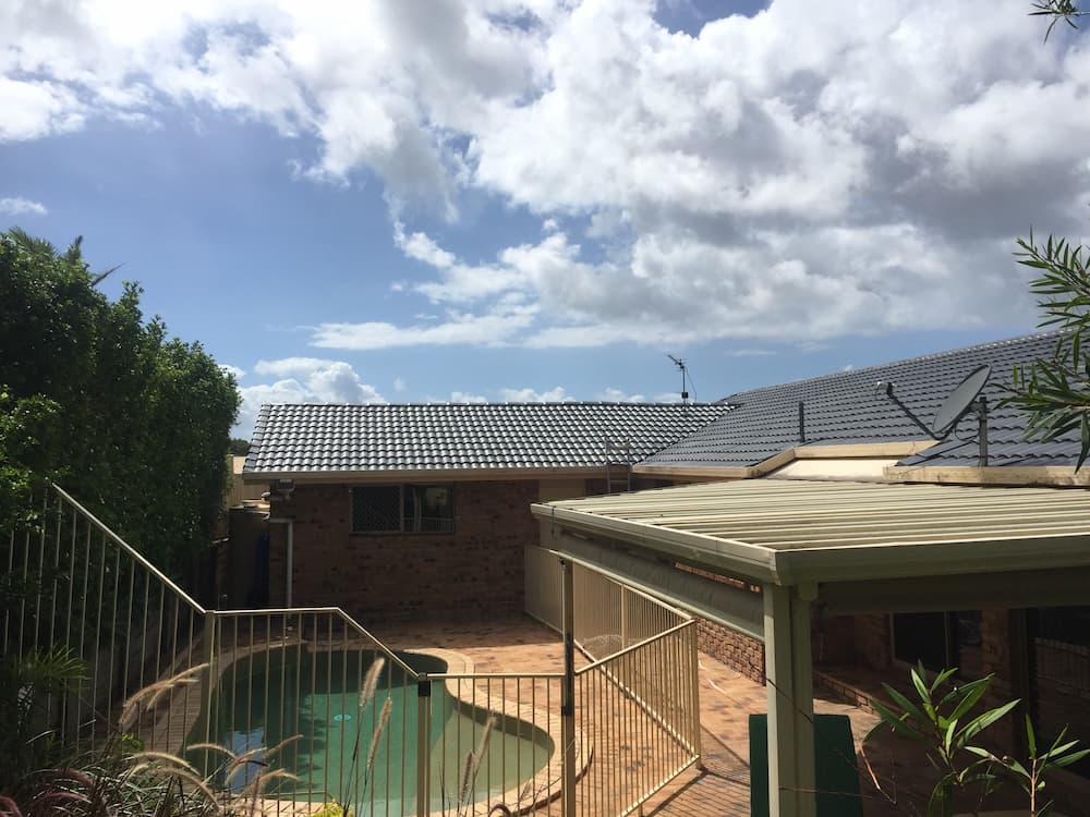 A House With a Swimming Pool in the Backyard — Killiby & Co Roofing Pty Ltd In Tweed, NSW