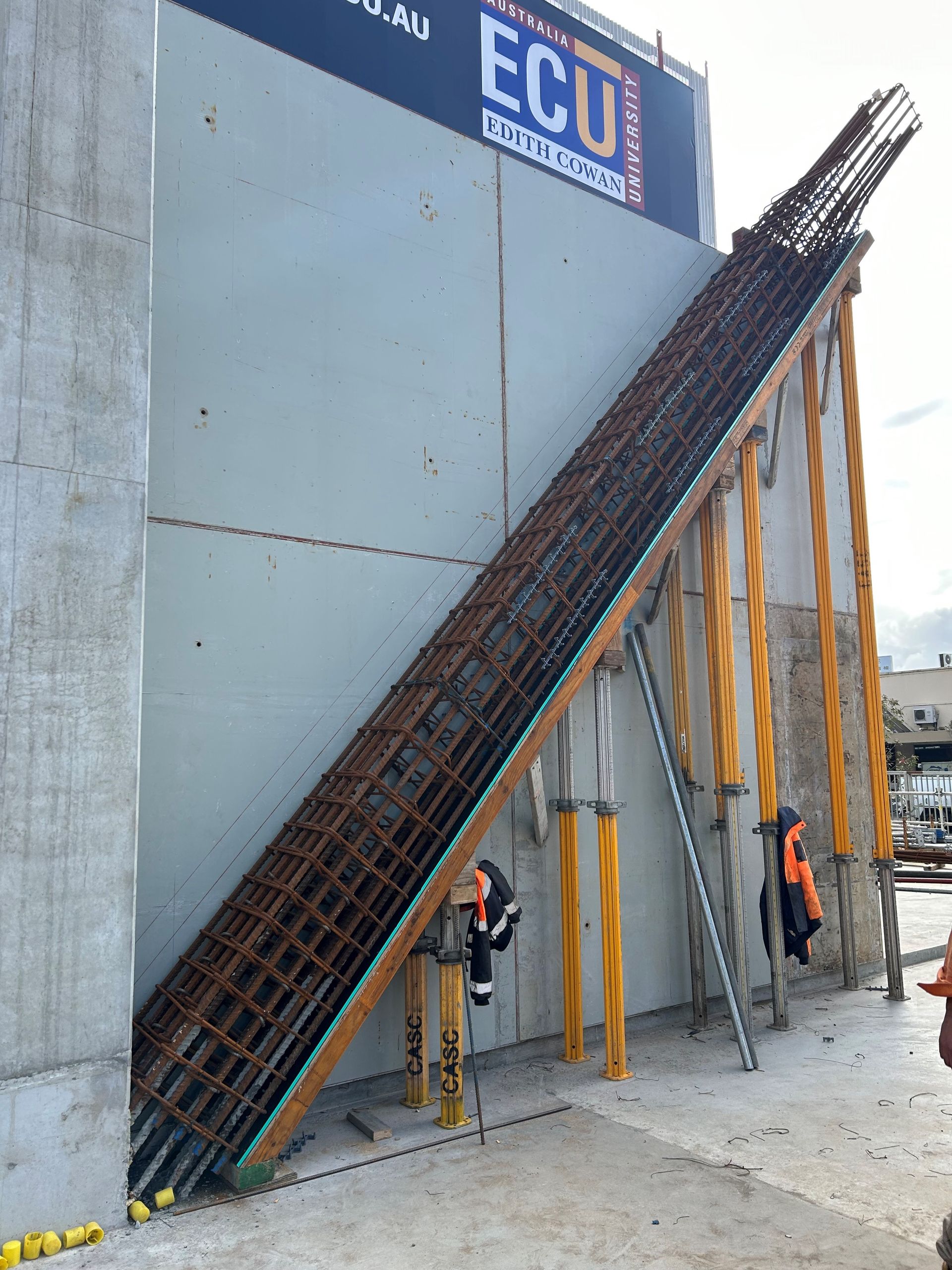 A construction site with a sign that says ecu on it