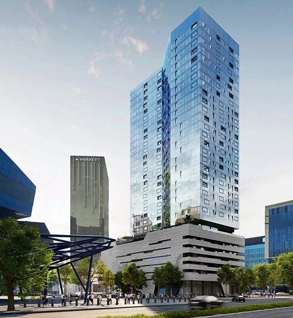 An artist 's impression of a large building with cars parked in front of it.