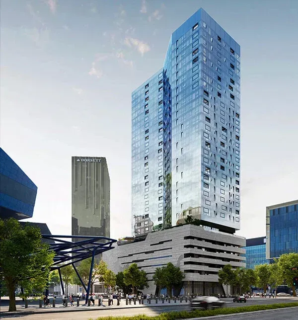 An artist 's impression of a tall building in a city