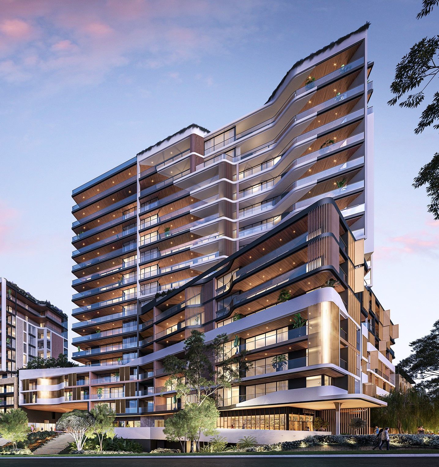 A group of people are walking in front of a tall building.
