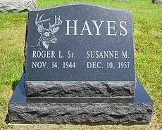 Black granite tombstone with deer engraving,