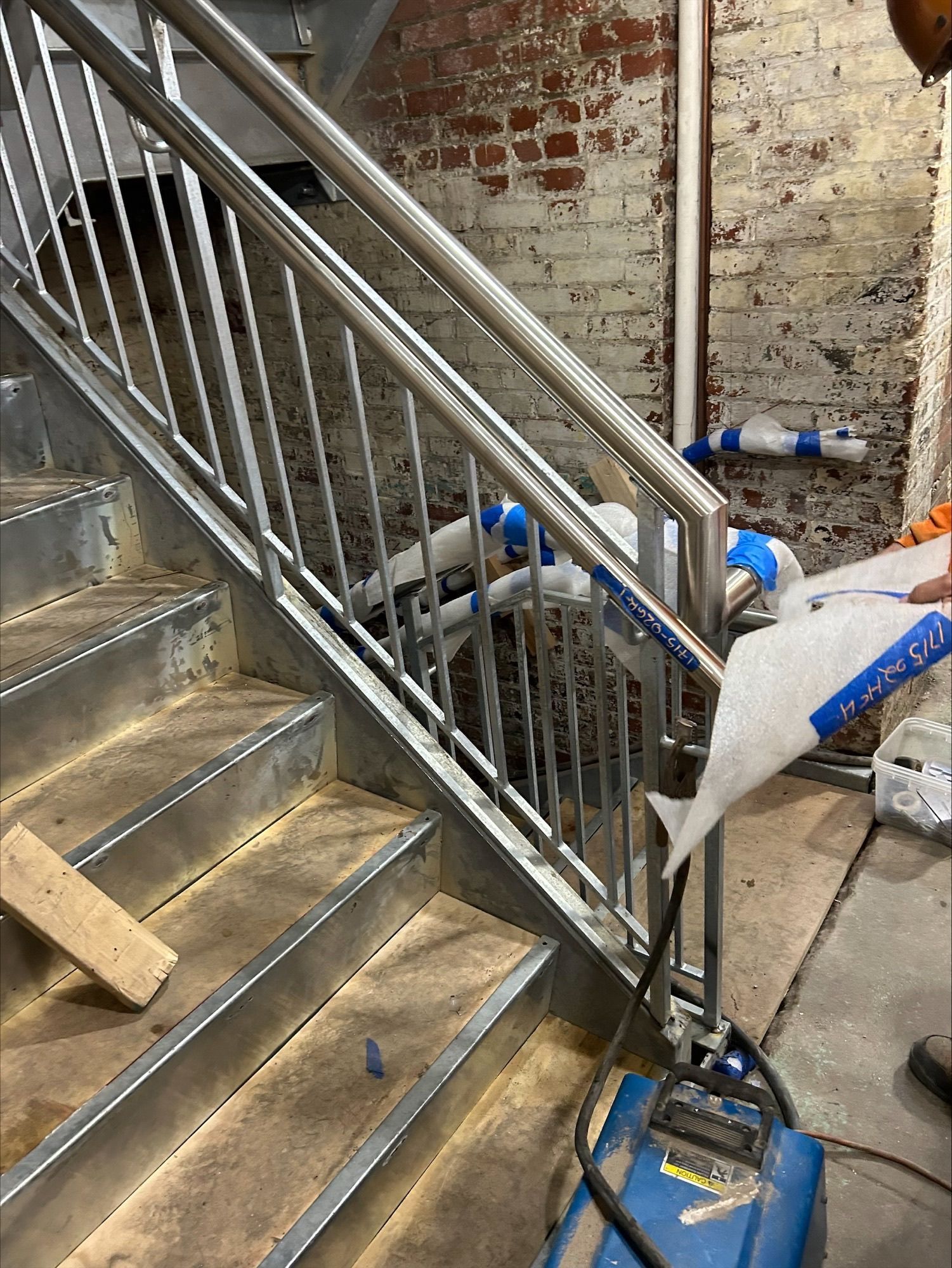 custom steel fabrication railing on staircase
