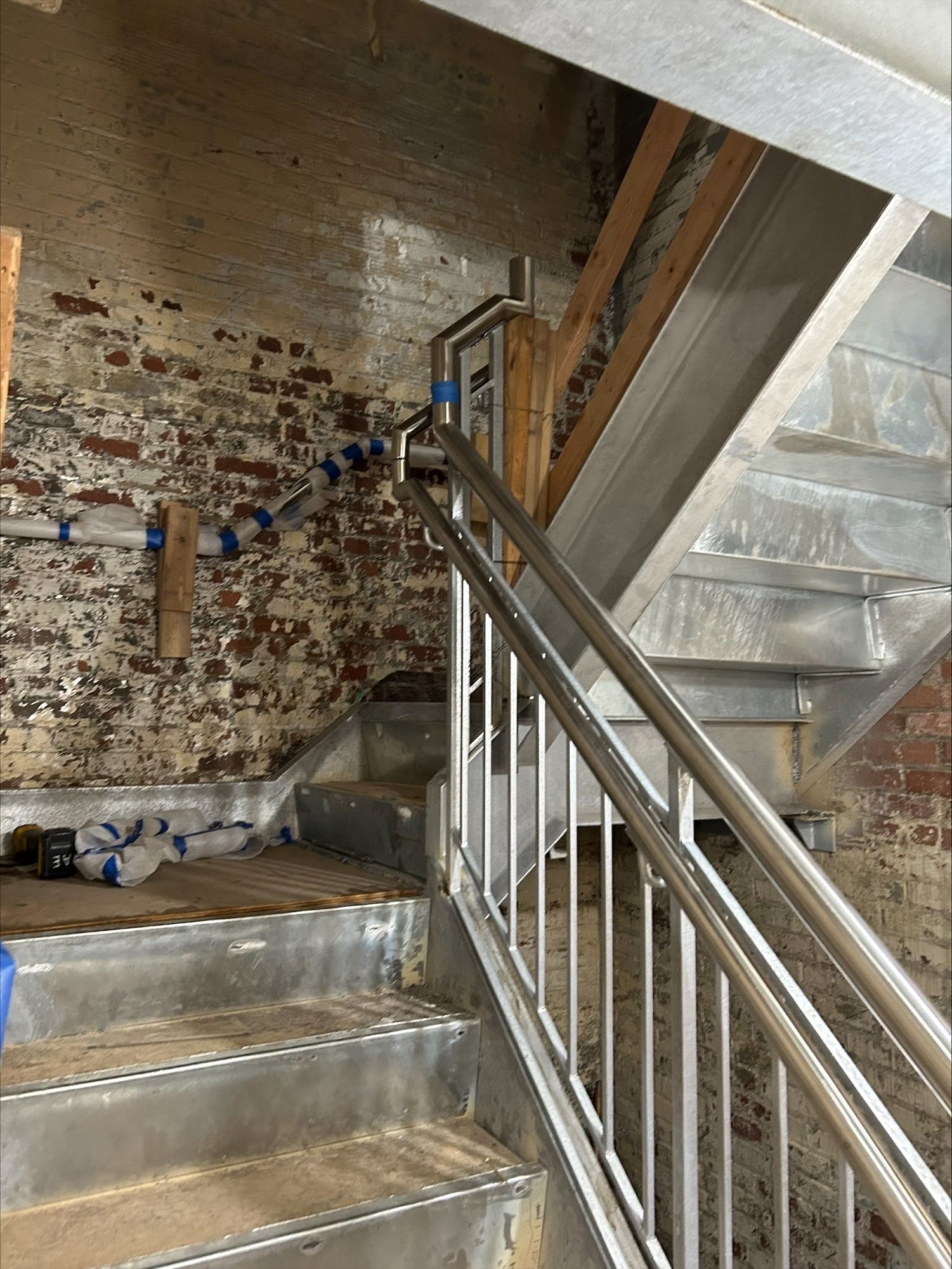 custom steel fabrication railing on staircase
