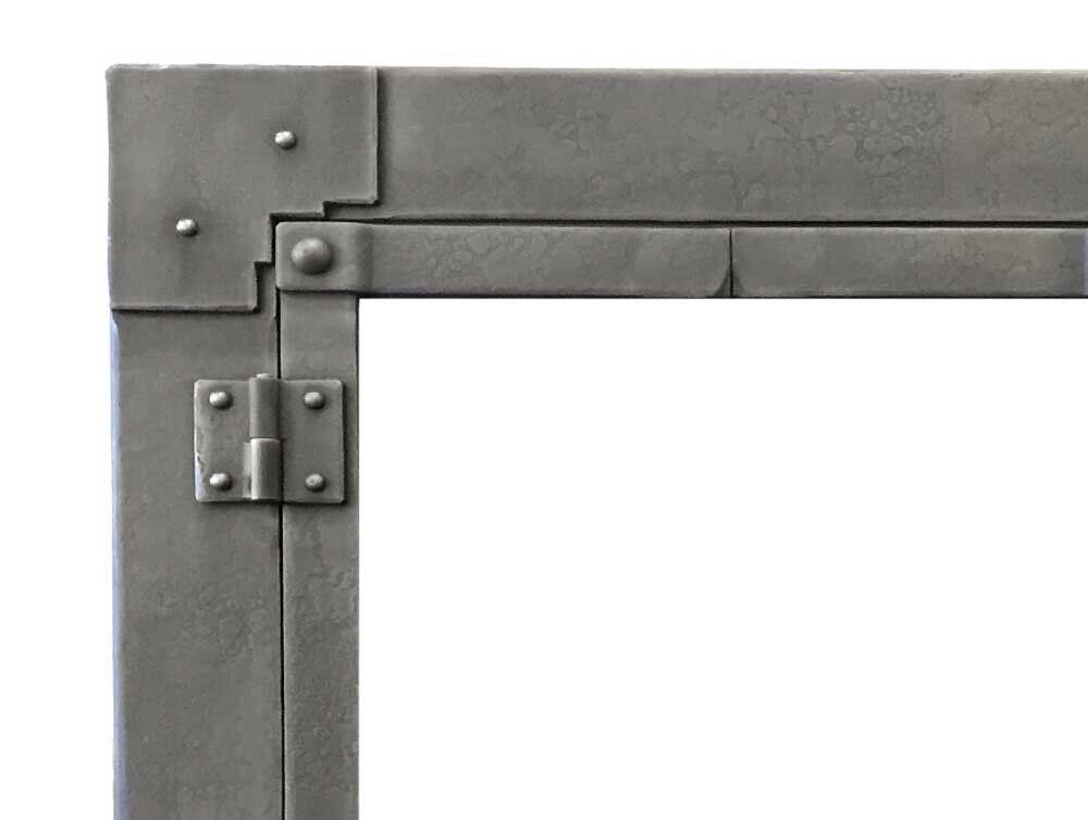 Metal frame corner with rivets and hinge.