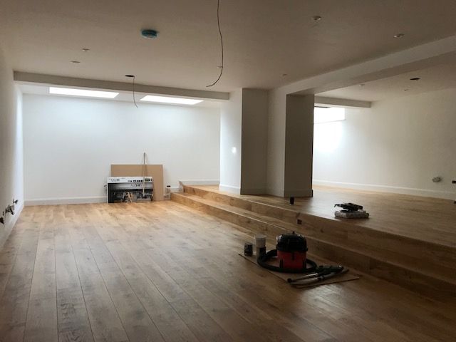 the process of converting a basement to a gym