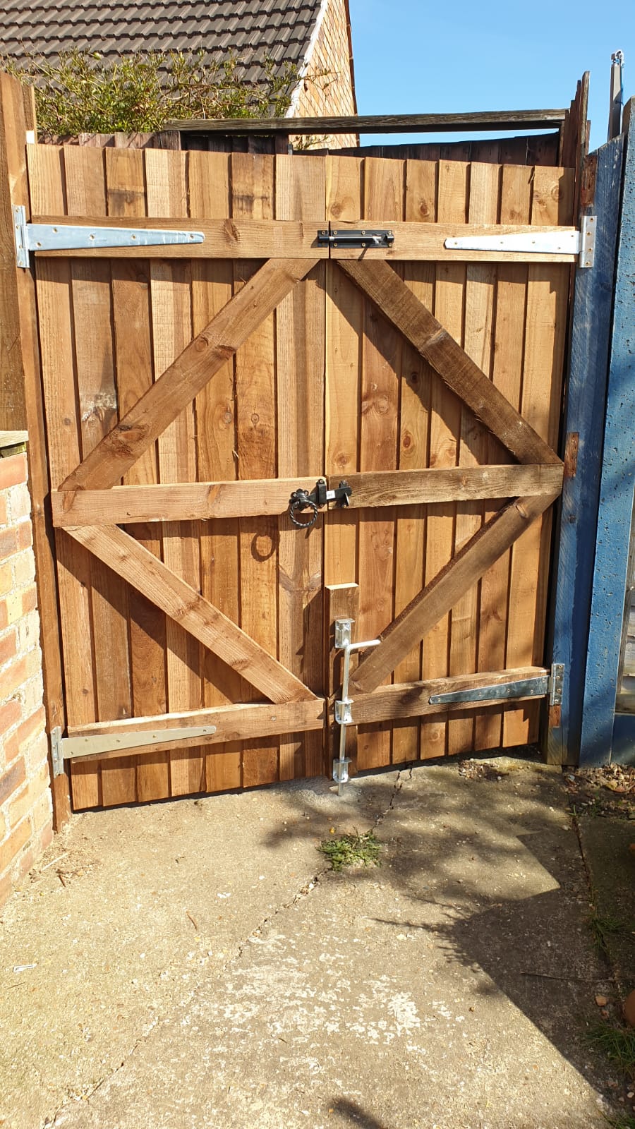 A 7 ft bespoke made double secure gate with all locks and fittings, suitable to park vehicle behind.