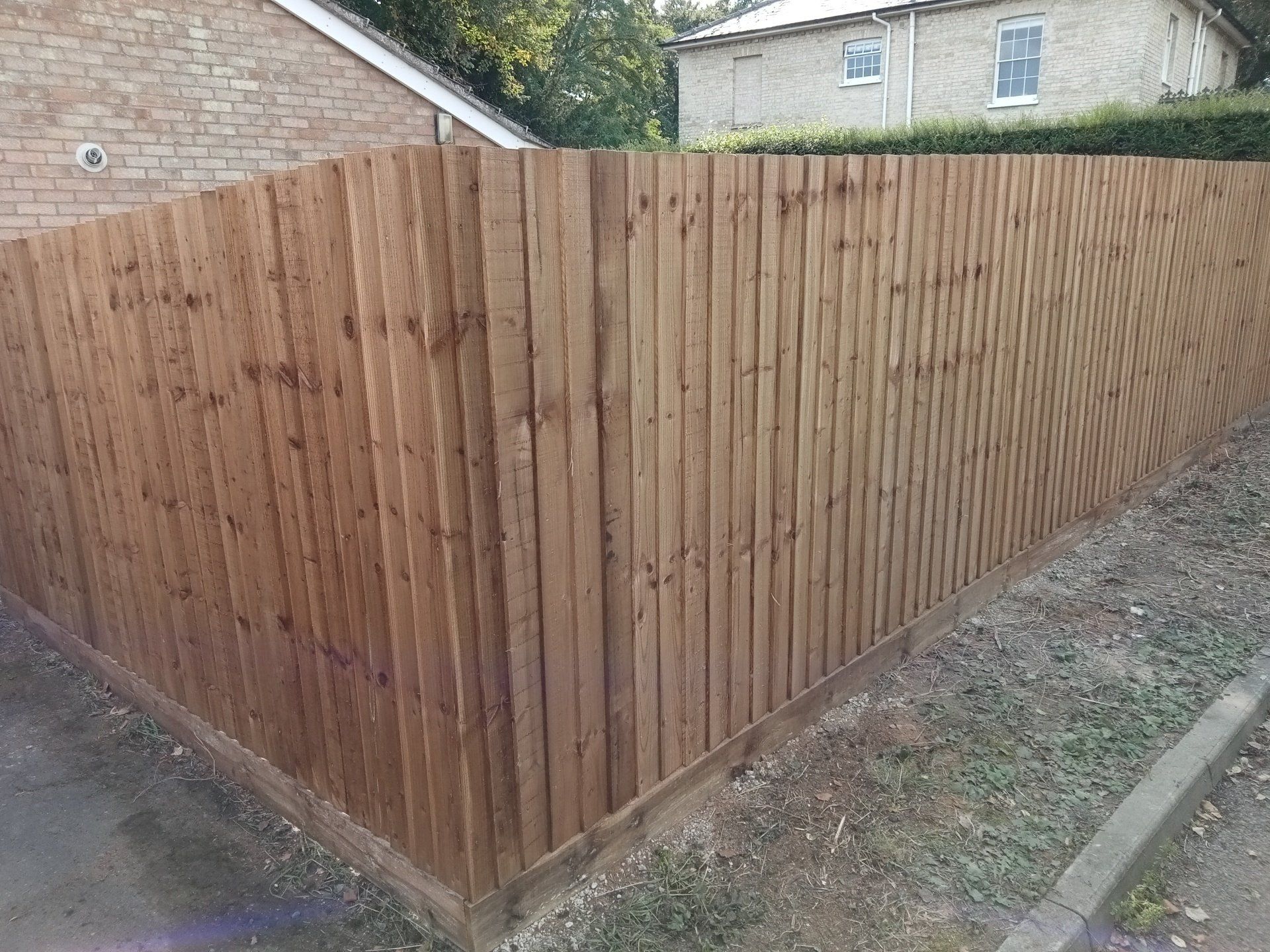 feather edge fence showing outside view as goes round corner
