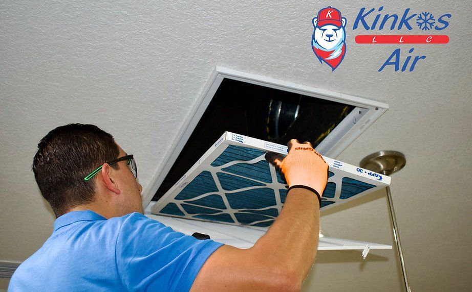 Worker Opening Air Ventilation Cover - Orlando, FL - Kinkos Air
