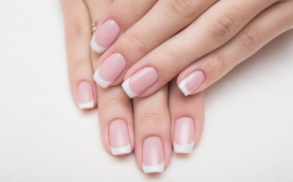 A Close Up of a Woman's Nails With Signature Nail Art Design — Xquisite Styles in Mount Warrigal, NSW