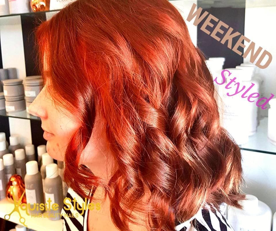 A Woman With Red Hair Has Weekend Styled Written on Her Hair — Xquisite Styles in Dapto, NSW