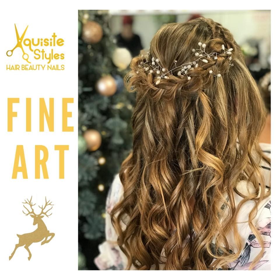 A Woman With Long Hair is Wearing a Half Up Half Down Hairstyle — Xquisite Styles in Albion Park, NSW