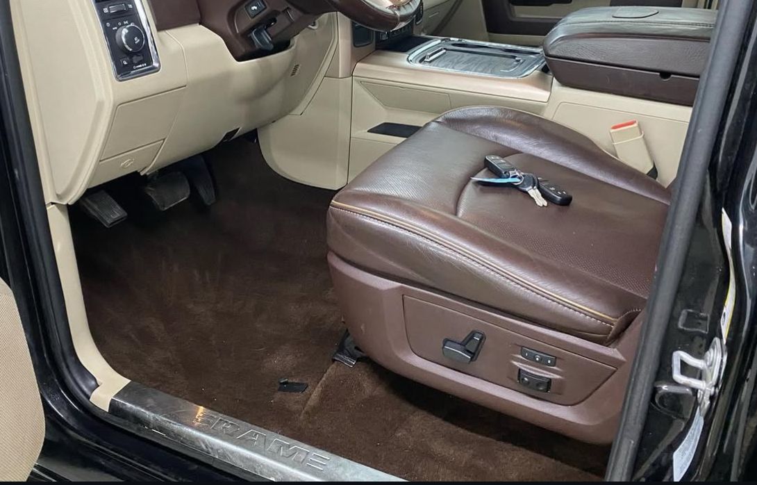 A yellow and white sports car on a black background.