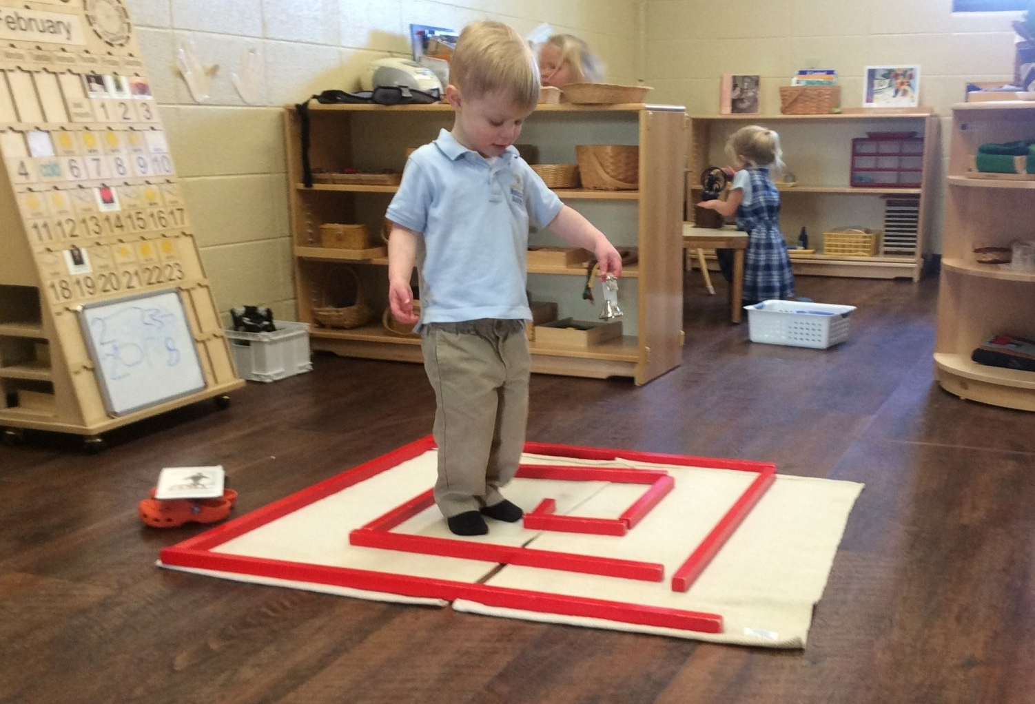 Guide and children in the classroom