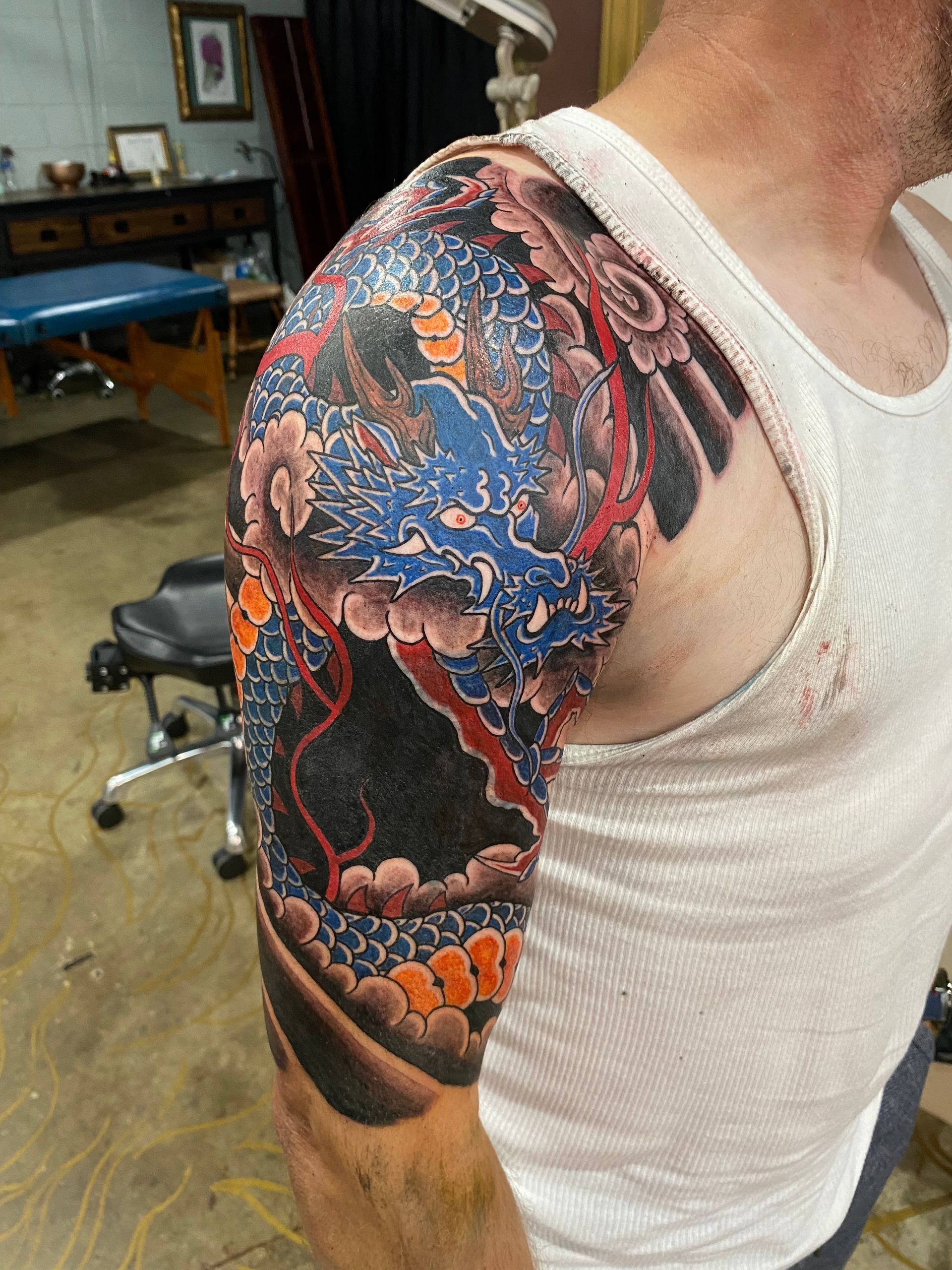 Intricate Japanese dragon shoulder tattoo, done at a walk-in tattoo shop in Raleigh NC.