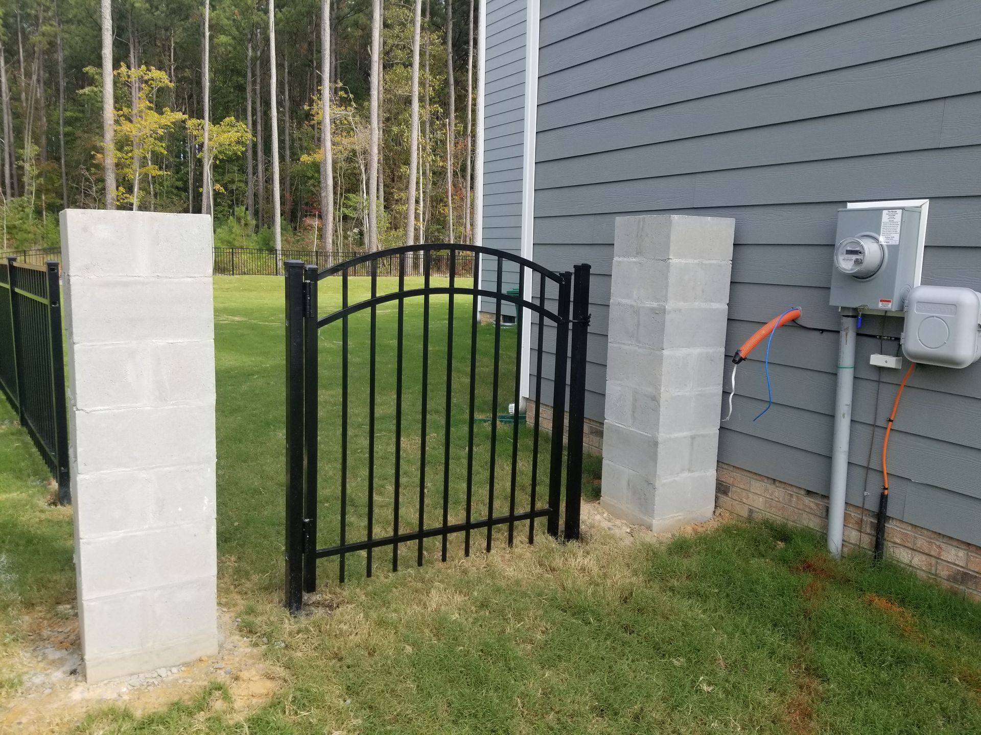 house with metal gate