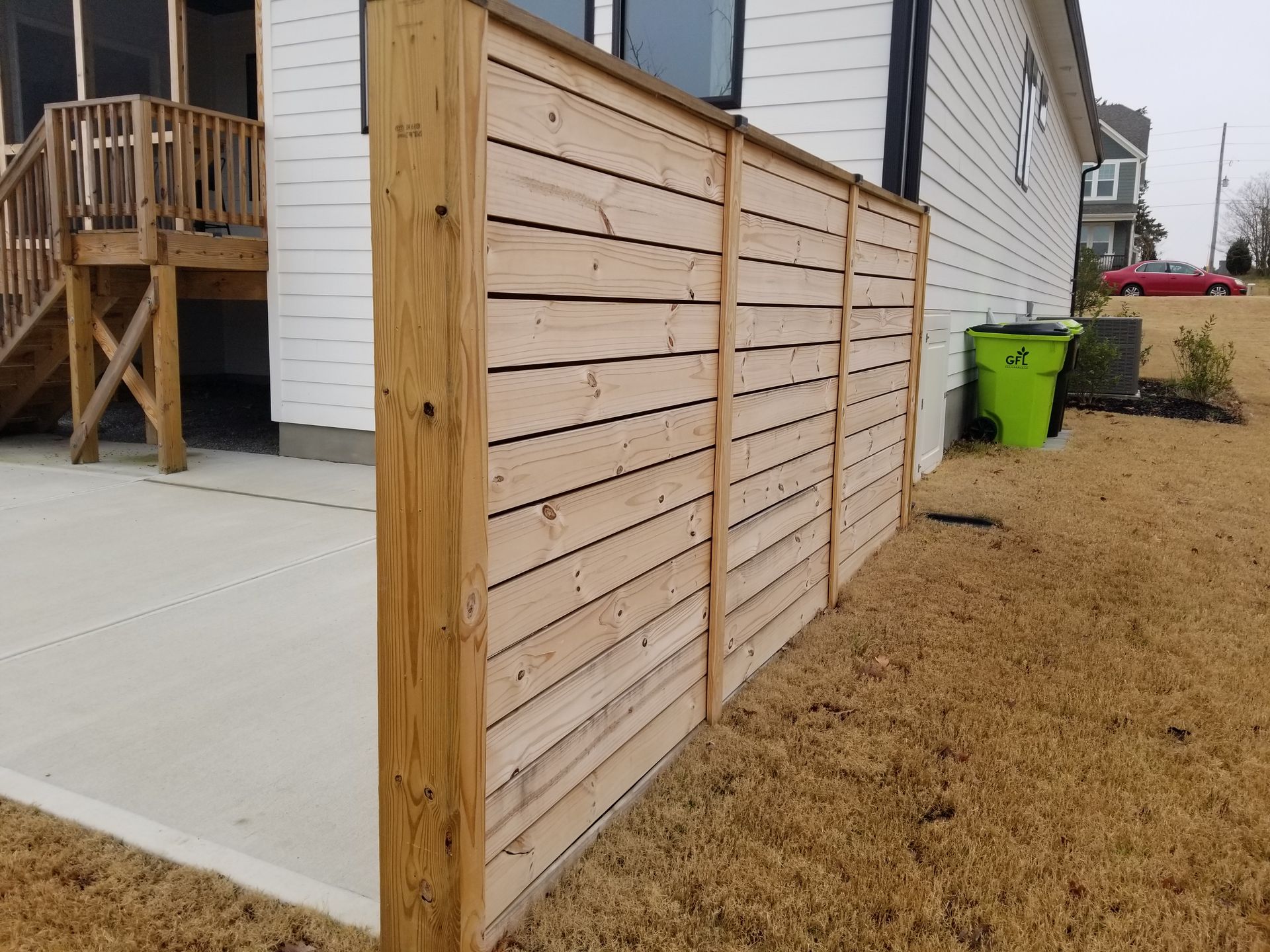 house with wooden fence