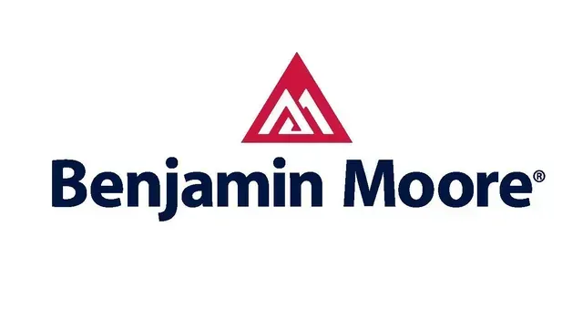 The logo for benjamin moore is a red triangle with a triangle in the middle.