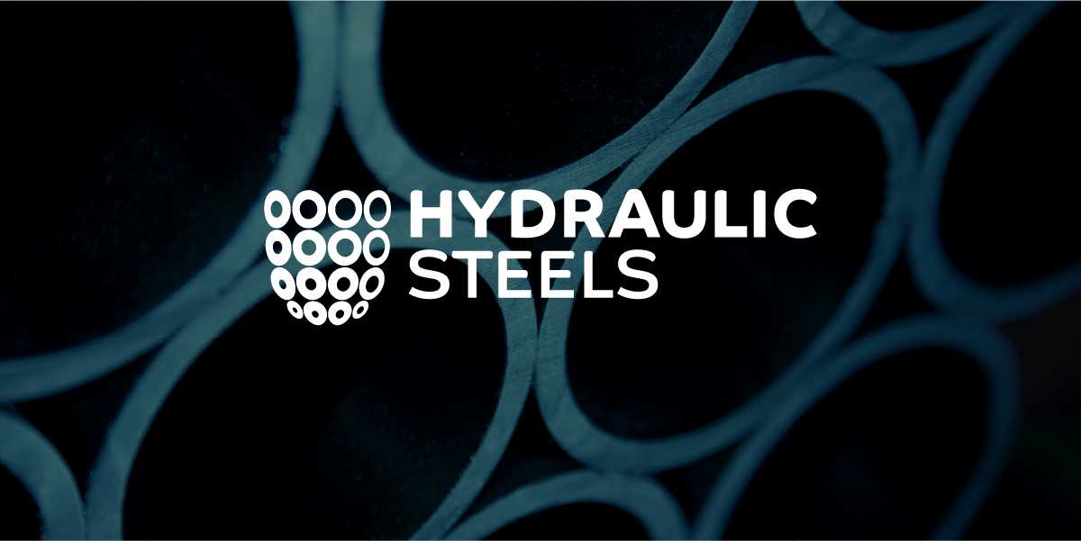 The Hydraulic Steels logo on top of an image of some stacked Hydraulic Cylinders