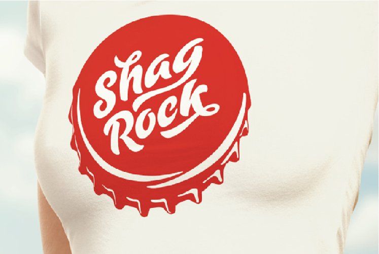 Shag Rock logo branding on a white t-shirt