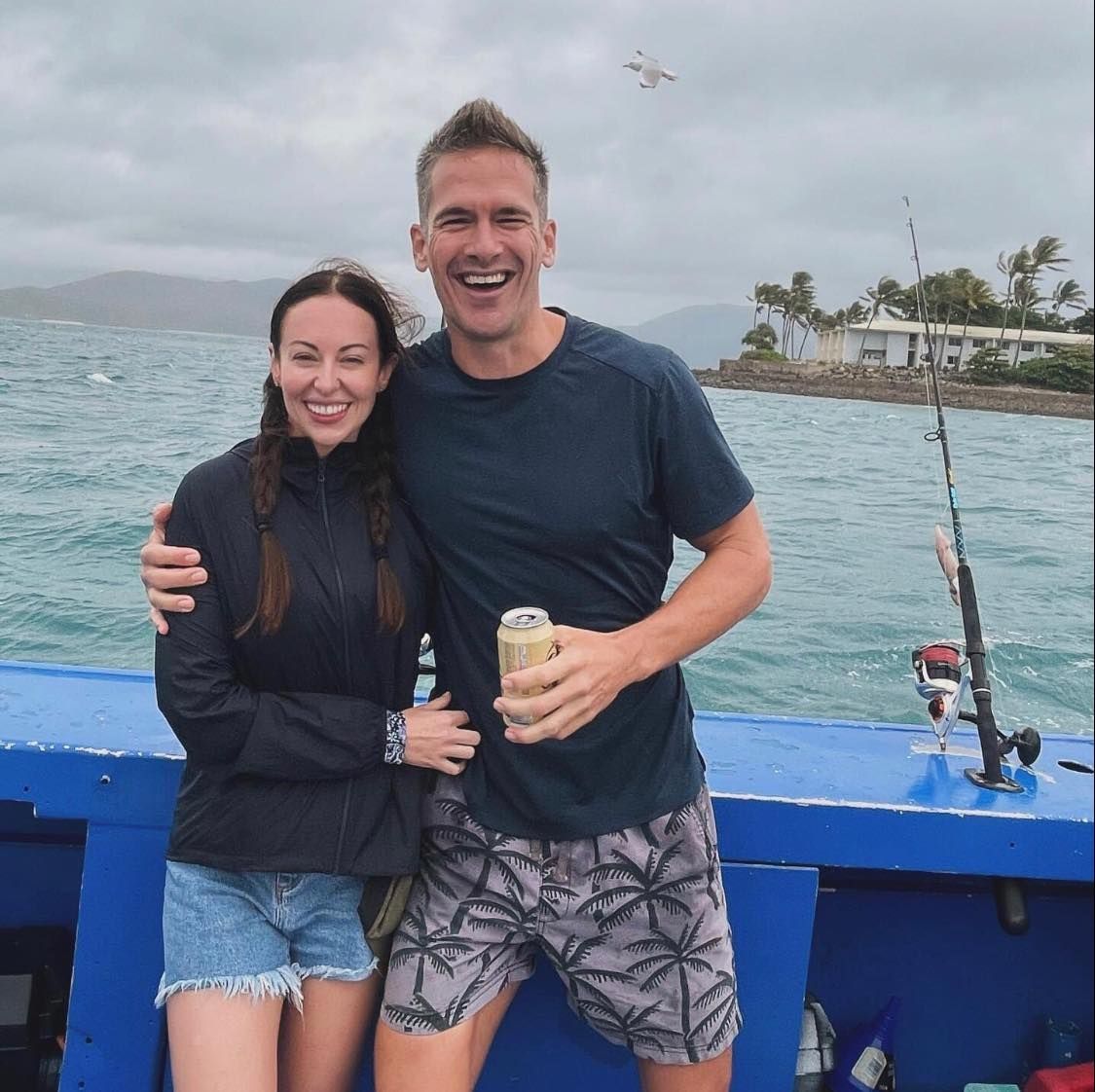 A Man and a Woman Are Posing for a Picture on a Boat — Whitsunday Fishing Charters In Airlie Beach, QLD