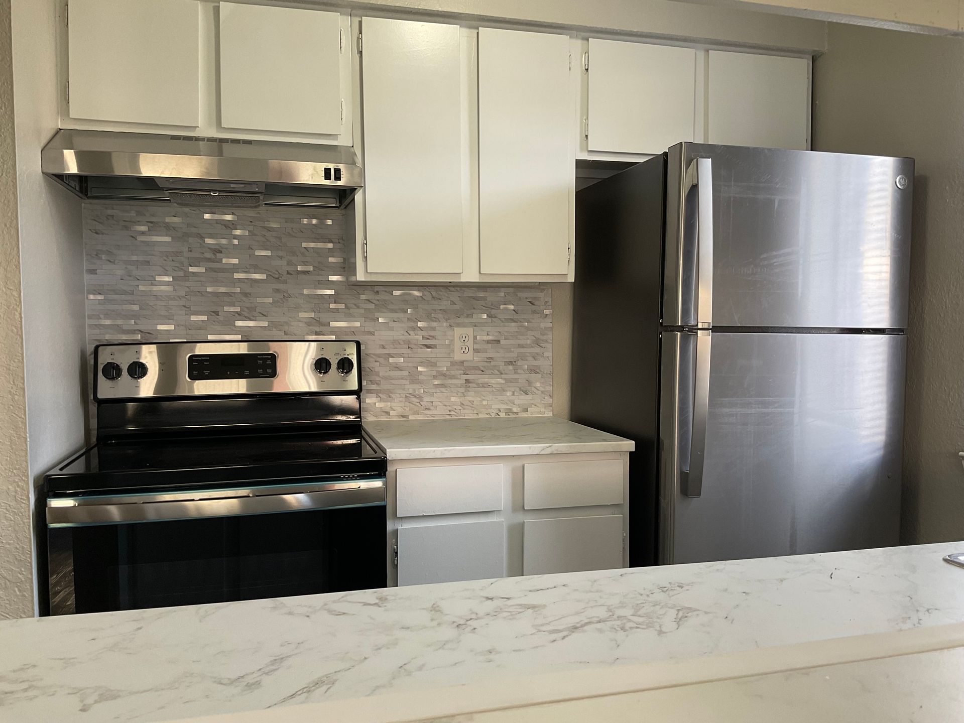 Cove interior kitchen counter and stove