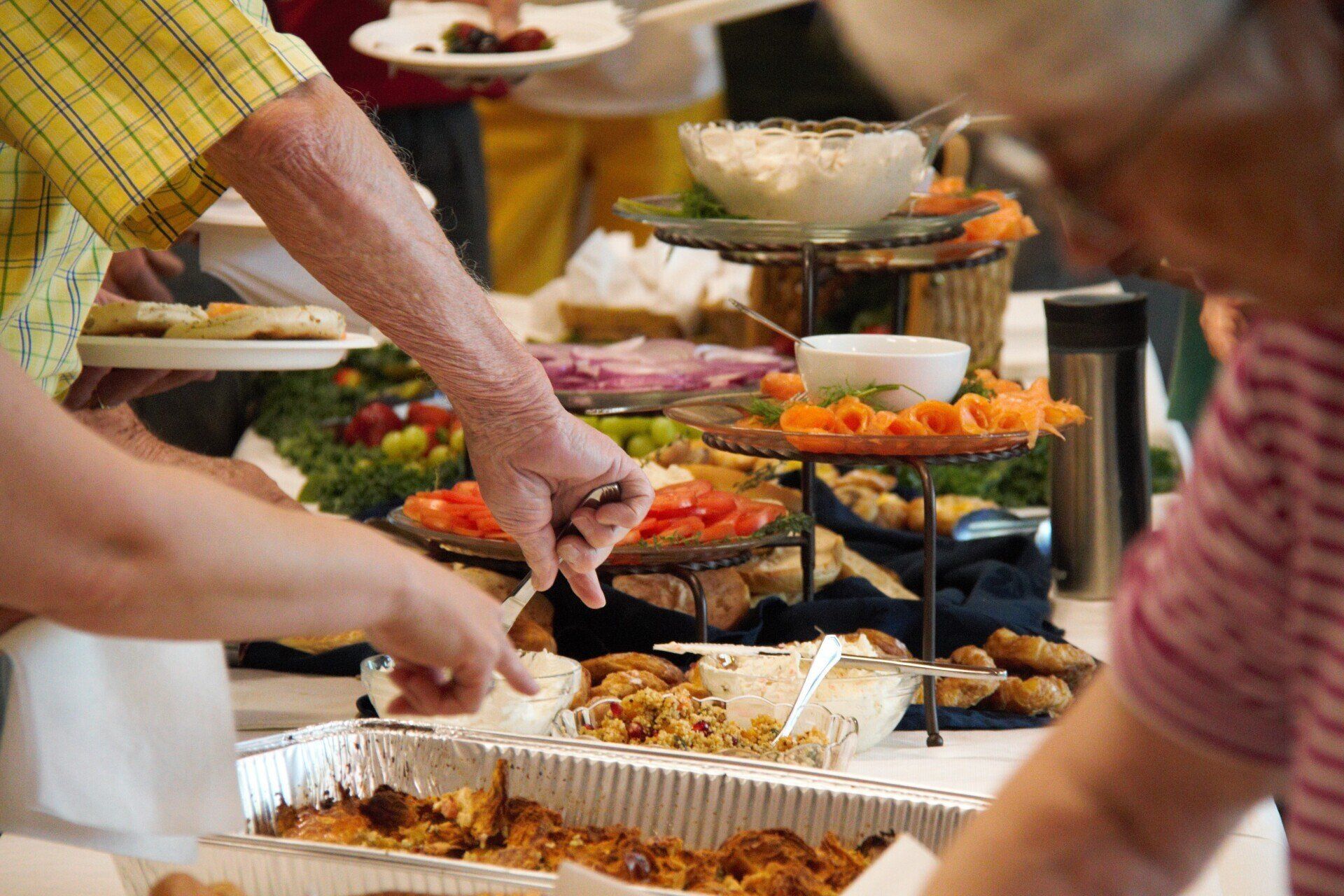 Photo of people serving themselves food