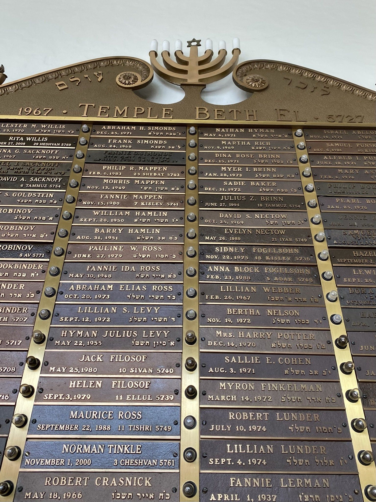 A photo of the yahrzeit boards at TBE
